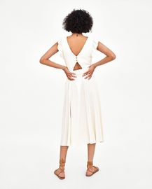 Elegant white linen maxi woman dress with bow